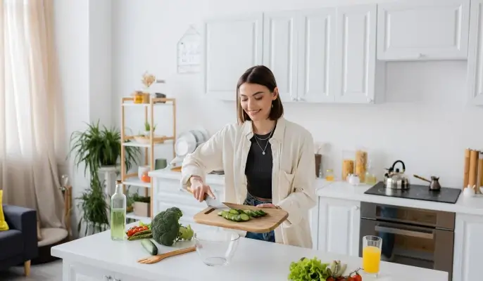 Colorful array of fresh, healthy ingredients including vegetables, fruits, and whole foods arranged beautifully
